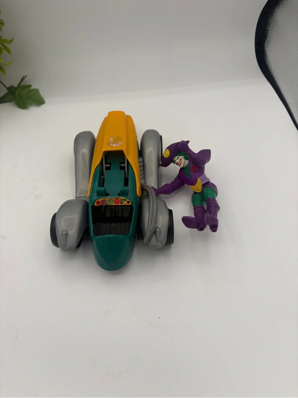 Purple & Yellow Joker Action Figure with Yellow-Green Batmobile Toy
